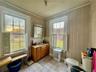 Bathroom with vanity, tile patterned flooring, toilet, and plenty of natural light