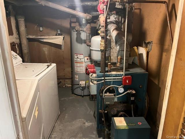 Utility room with a heating unit and water heater