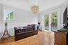 Another generously sized upstairs en suite features a charming Juliet balcony overlooking the neighborhood, a spacious walk-in closet and its own priv