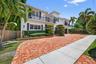 A grand exterior presence complemented by a sweeping circular brick paver driveway, a spacious two car garage and ample additional parking for guest, 