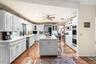 Kitchen featuring center island w/ prep sink & double oven