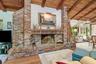 Center of family room w/ wood burning fireplace