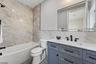 full bathroom with tub