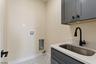 laundry room with utility sink