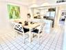 Open Concept Kitchen with Breakfast Bar and Flexible Space Dining Area