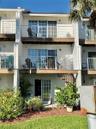 Three Level Townhouse with Waterway & Pool Views.