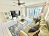 Spacious Living Area with Private Balcony.
