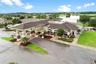 Central to the community is the main clubhouse with dining/bar areas, golf pro-shop, locker rooms and . . .