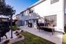 Back yard patio with double awning
