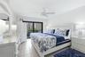 Primary bedroom with impact rated slider to lanai