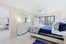 Primary bedroom with impact rated slider to lanai
