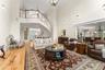 Family room looking back towards foyer & floating staircase