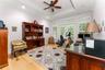 Study/or 5th bedroom with door leading to private side porch