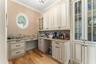 Butlers pantry between Kitchen and formal dining room