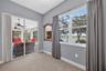 Step straight from your private primary sanctuary onto the sunlit lanai and pool deck via large sliding glass doors.