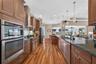 Double-oven configuration, featuring a built-in microwave/convection oven combination set above a traditional wall oven.