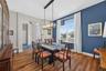 The spacious dining room offers plenty of room to expand your table, making it easy to host family dinners, holiday celebrations, and neighborhood get