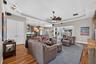 An expansive great room flows effortlessly into the casual dining area and kitchen, creating the ultimate hub for daily living and entertaining.