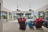 The lanai is spacious and has plenty of space in the shade, with easy access to the pool and sunshine.