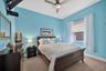 A bright and welcoming retreat, this third bedroom offers generous proportions to comfortably accommodate overnight guests in style.