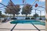 Take a refreshing dip in the pool while taking in the vibrant waterfront activity on the lake.