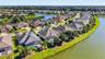 An impressive aerial perspective of the premier waterfront homes situated along peaceful Pawtucket Pass.