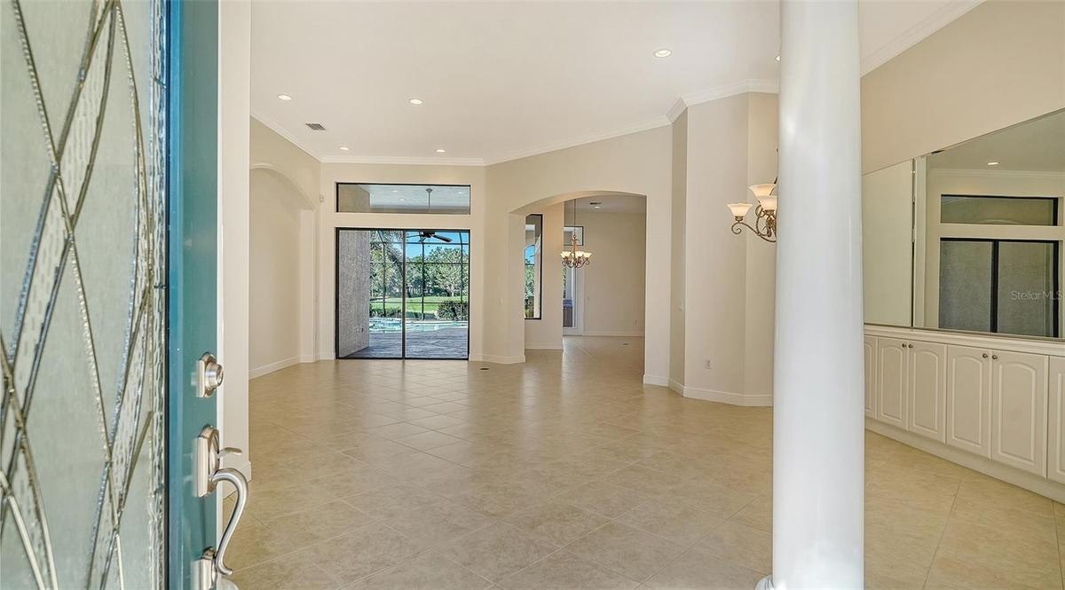Perfect floor plan with seamless transition from entry to living room and dining room