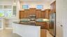Spacious kitchen with newer appliances including an induction range.