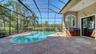 Resort style pool with self cleaners and pebbletec