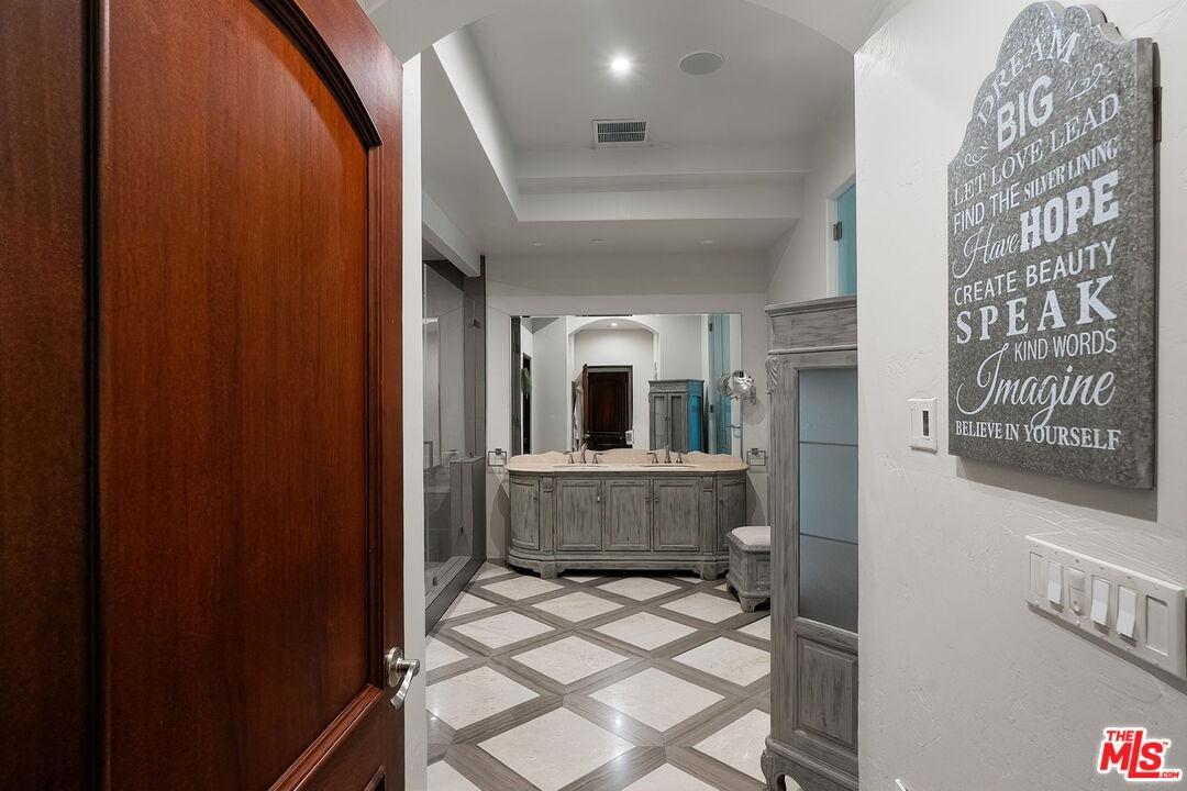 En suite bathroom entry with p