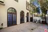 Private backyard with arched F