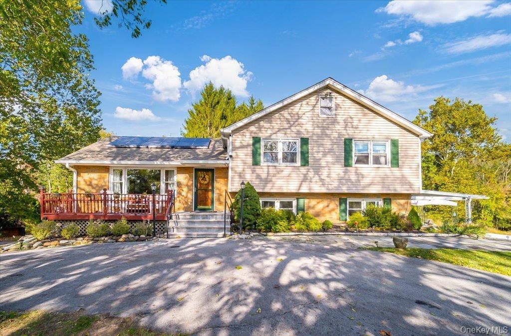 This lovely home graces the private park-like grounds ... your own mini-estate!!