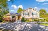 This lovely home graces the private park-like grounds ... your own mini-estate!!