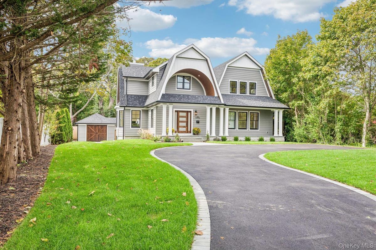 You've arrived. A newly built 5-bedroom, 4-bath residence at 10 Nelson Avenue, Blue Point, NY, where the 20-acre Blue Point Nature Preserve and its pa