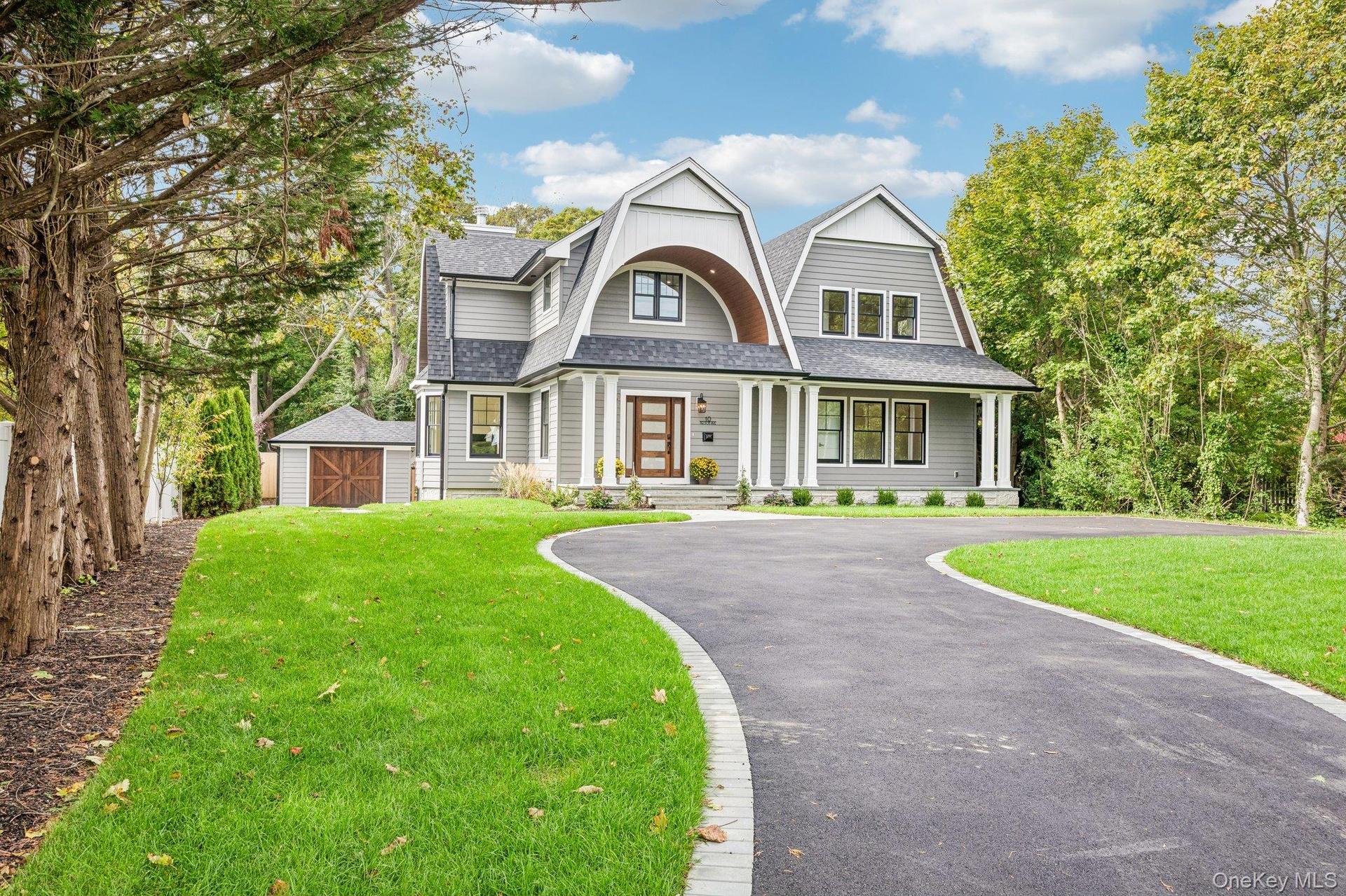 You've arrived. A newly built 5-bedroom, 4-bath residence at 10 Nelson Avenue, Blue Point, NY, where the 20-acre Blue Point Nature Preserve and its pa