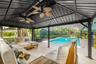 Pavilion featuring dual ceiling fans and custom made furniture.