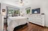 2nd Bedroom has beautiful blinds and impact sliding windows with valances