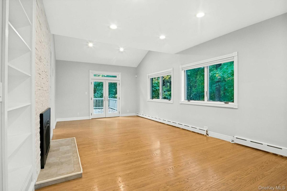 Bright living room with access to deck.