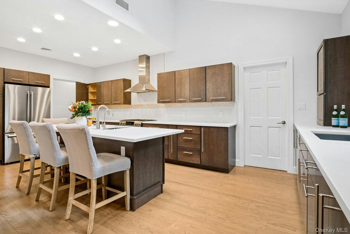 Custom walnut cabinetry.