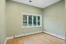 Bedroom #2 with large windows.