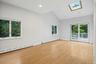 Primary bedroom with tons of natural light.