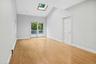Primary bedroom with sliders to rear deck.