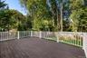 Large deck for easy flow and entertaining located off the family/ kitchen area. Easy to grill, sit and relax.