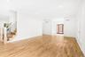 Fireside living opens to the kitchen. Monday mornings, Chair Yoga at the Bayport-Blue Point Library, a 700-foot stroll, then a cappuccino at CoHo Coff