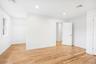 A quiet, well-proportioned bedroom. Little ones love the fenced playground at Corey North Park by the Blue Point Marina, then a snow cone at Beach Sid
