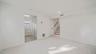 Entrance to lower level and full bath and laundry room