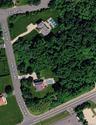 Aerial Survey. Depicting the physical boundaries, lot coverage, and site plan for the property