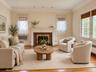 Living room featuring wood-finish flooring, a masonry fireplace with a classic mantel, recessed lighting, and crown molding