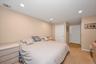 Large primary bedroom easily fits a king size bed