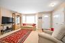 Natural sunlight bathes this living room. Great for entertaining or a quiet evening at home